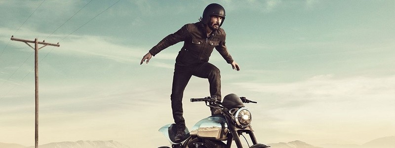 Киану Ривз верхом на мотоцикле в рекламном ролике